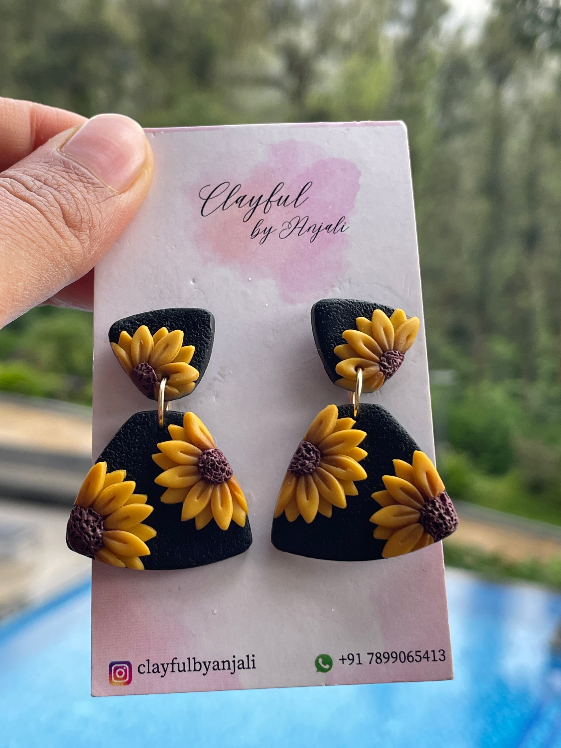 sunflower design earrings with black base