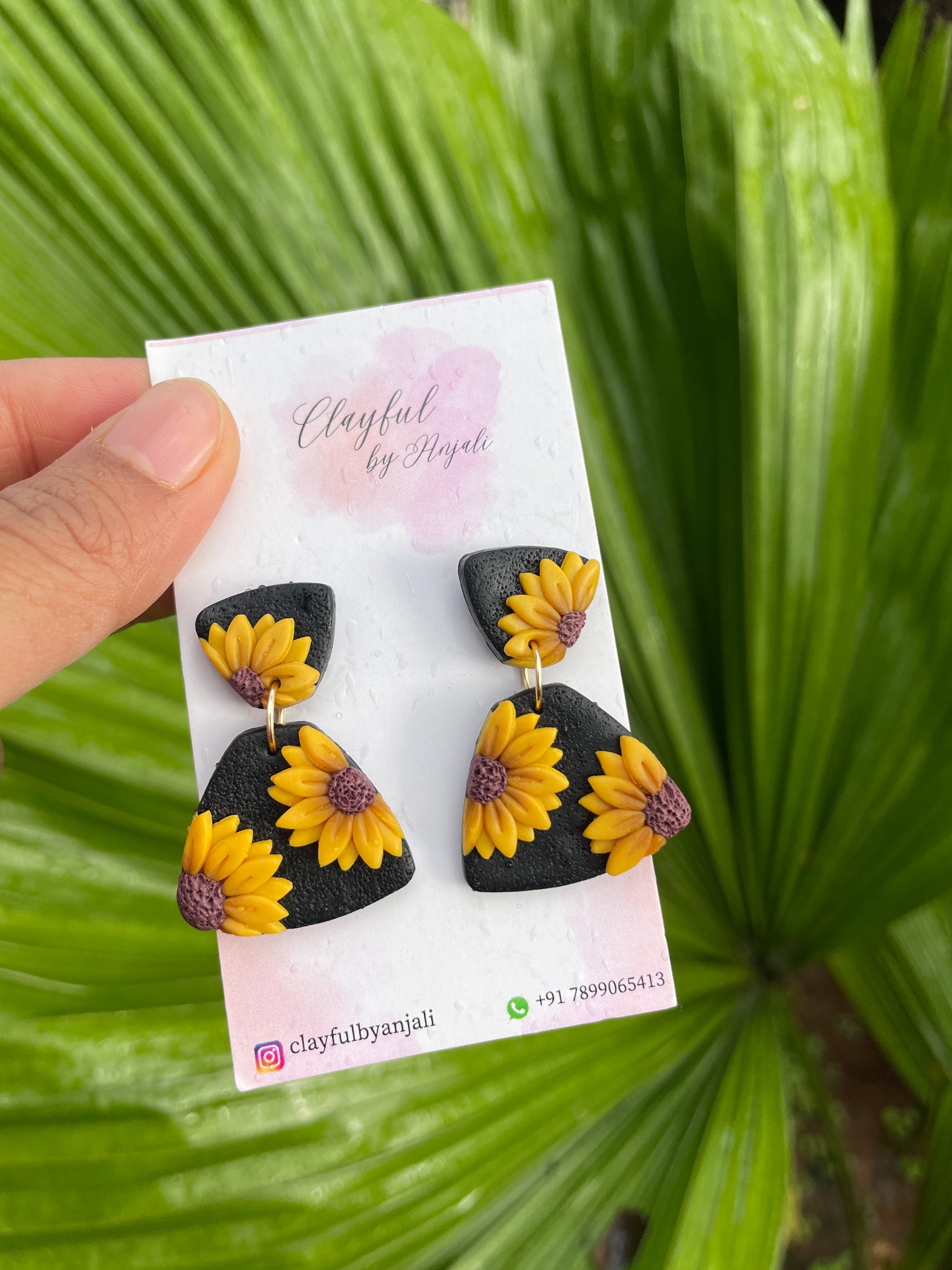 sunflower design earrings with black base